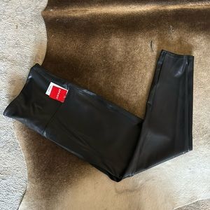 Brand new Spanx with tags.